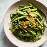 NO-COOK CRUNCHY SNAP PEA SALAD WITH CHILI CRISP